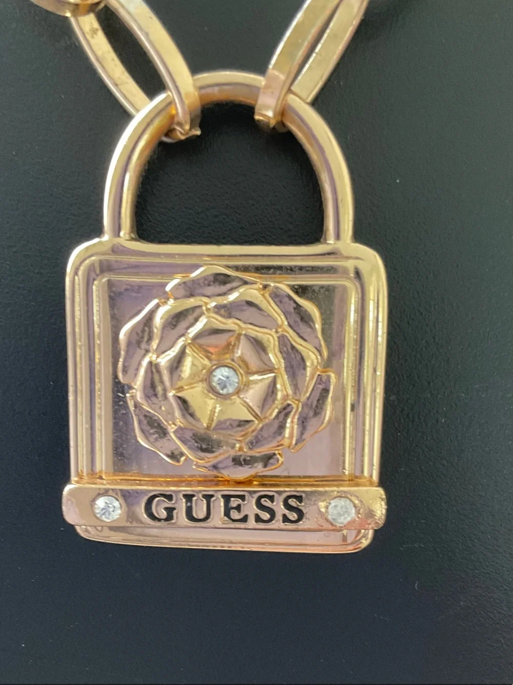 GUESS Gold Padlock Pendant with Floral Accent